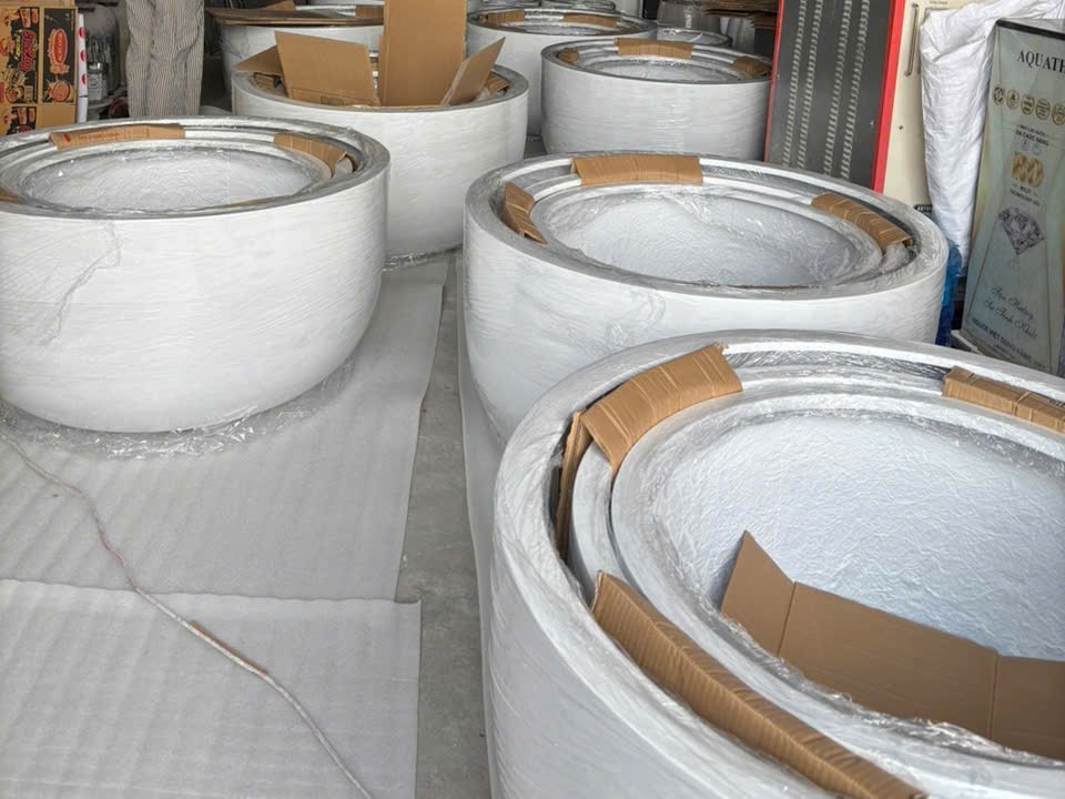 Fiberstone planters nested and wrapped for export shipping